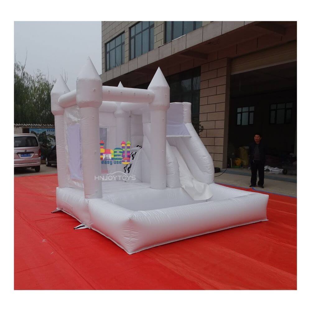white mini bounce house