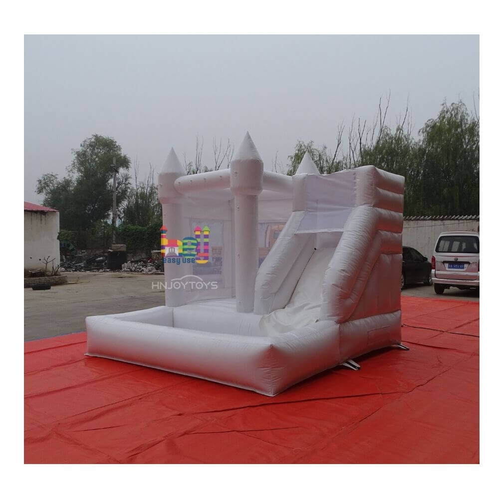 white mini bounce house