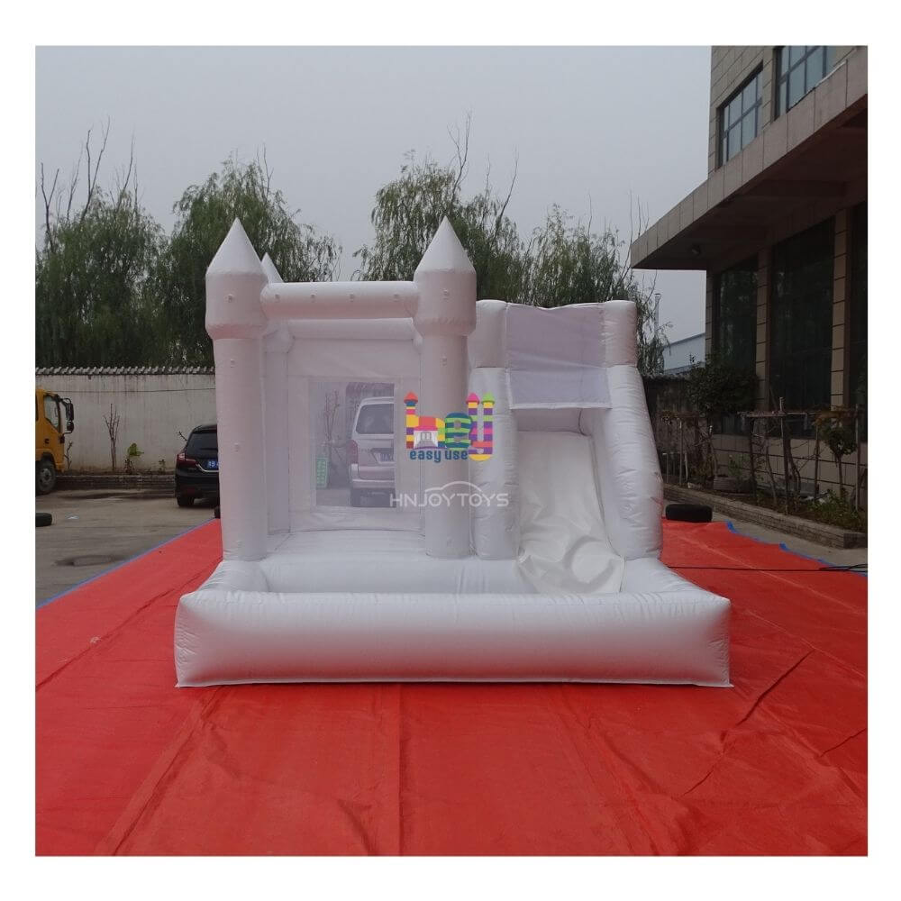 white mini bounce house