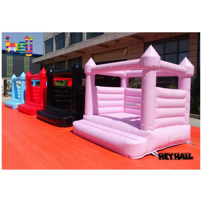 custom size kids inflatable bounce houses in pastel colors