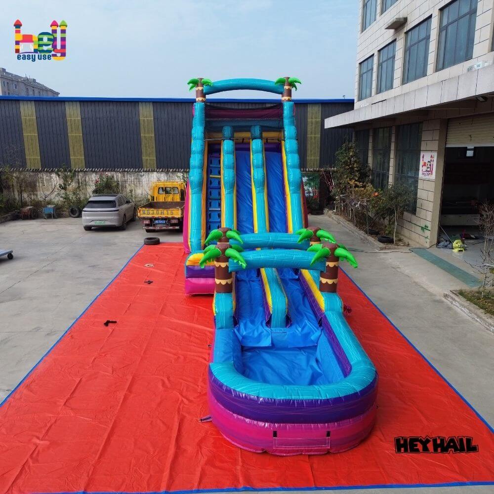 colorful inflatable slide palm tree