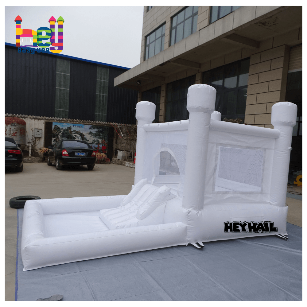 Commercial white bounce houses with slide and ball pit