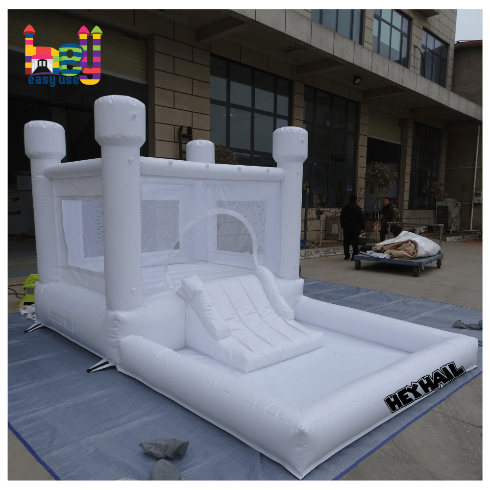 Commercial white bounce houses with slide and ball pit