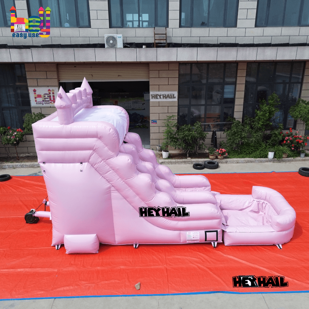 outdoor pastel pink inflatable water slide