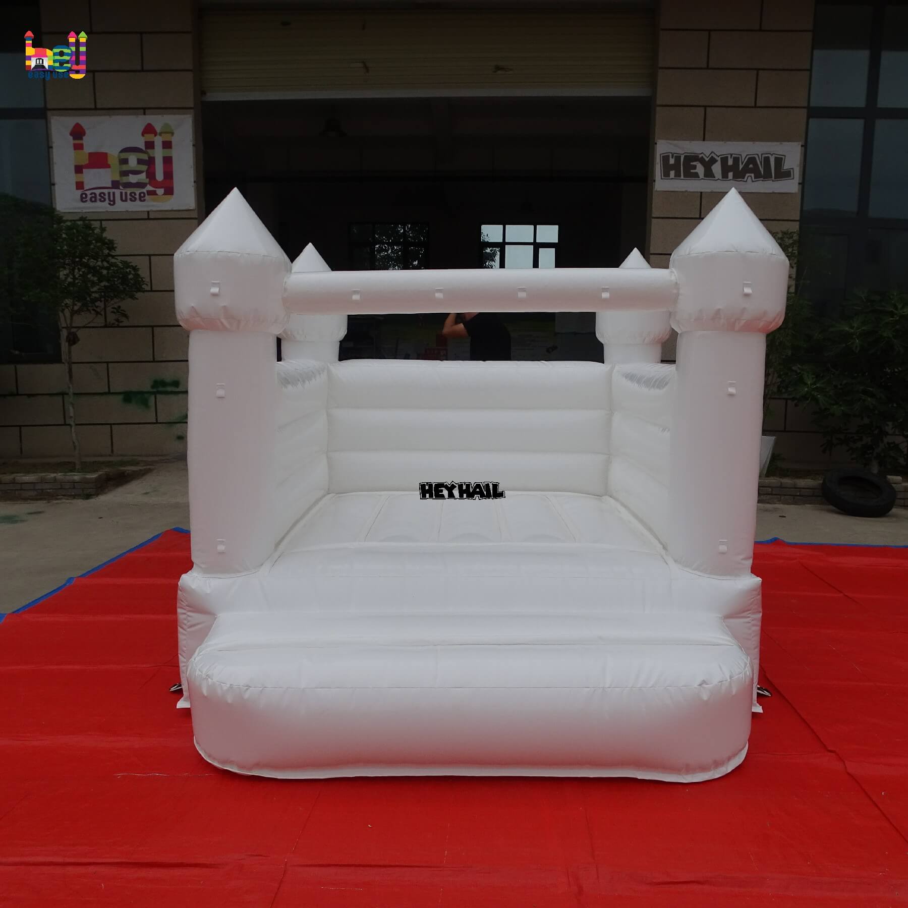 pure white inflatable bounce house on promotion
