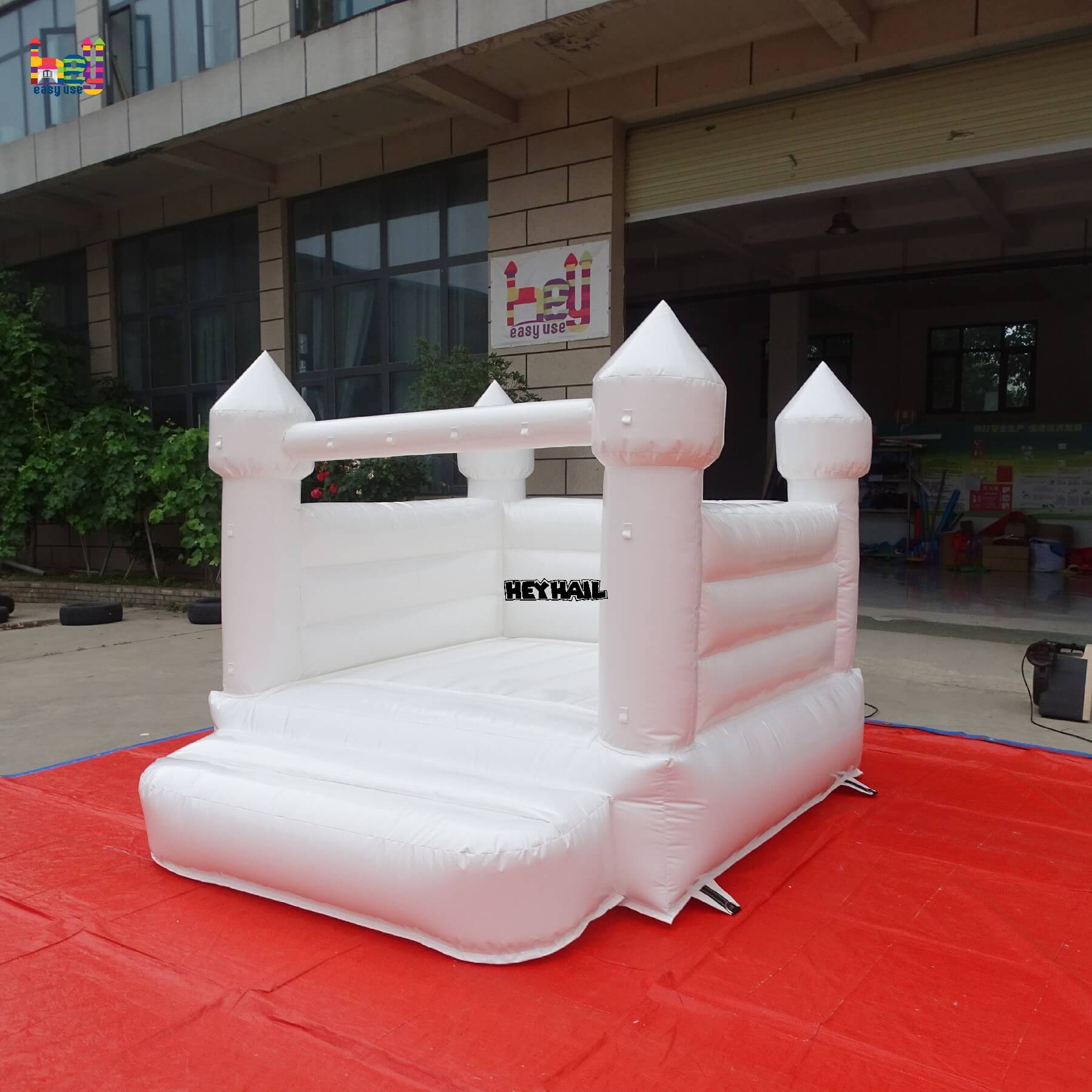 pure white inflatable bounce house on promotion