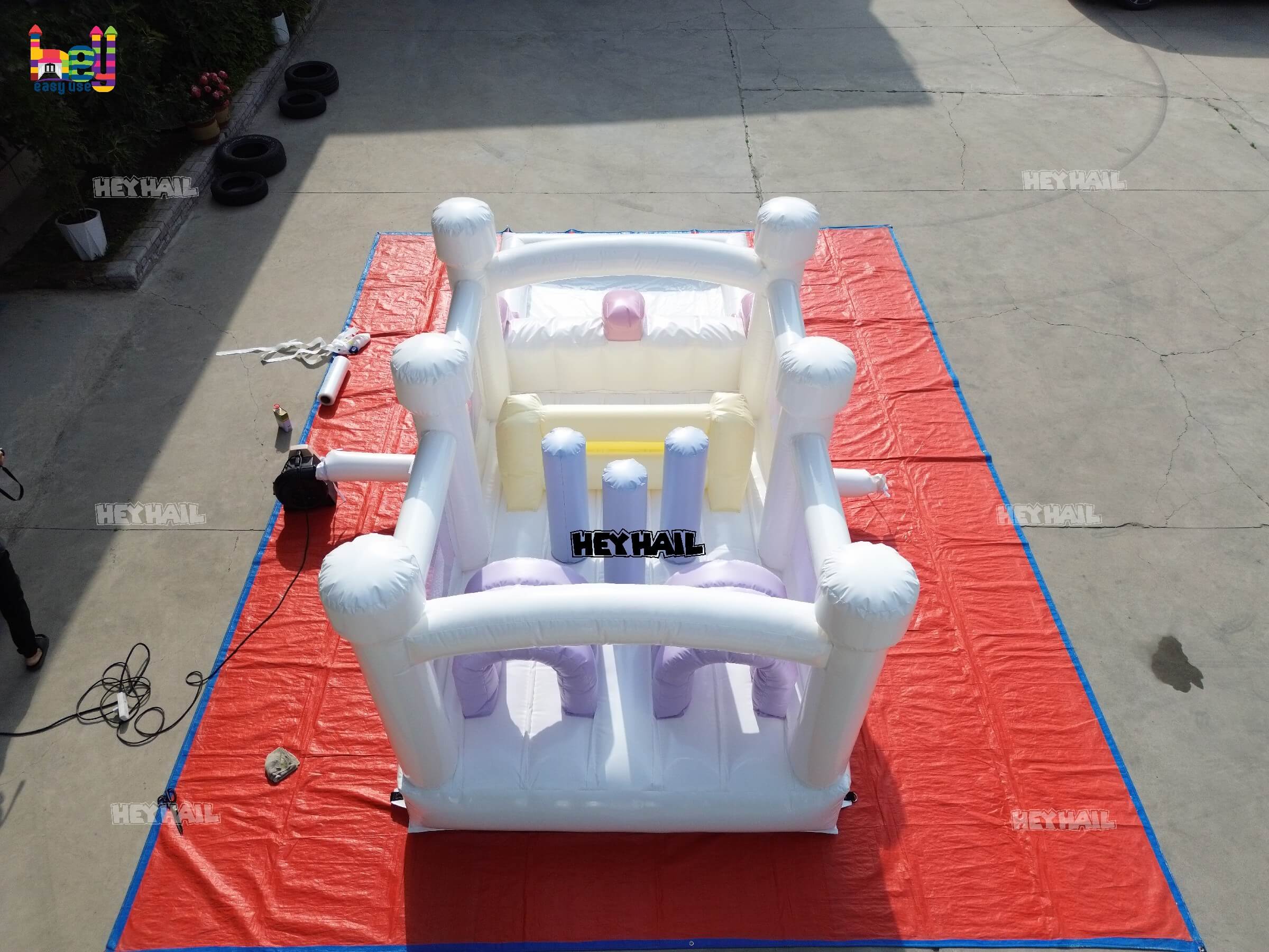 pastel color inflatable obstacle course for business use